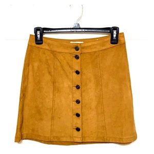 Tan colored women’s button up skirt